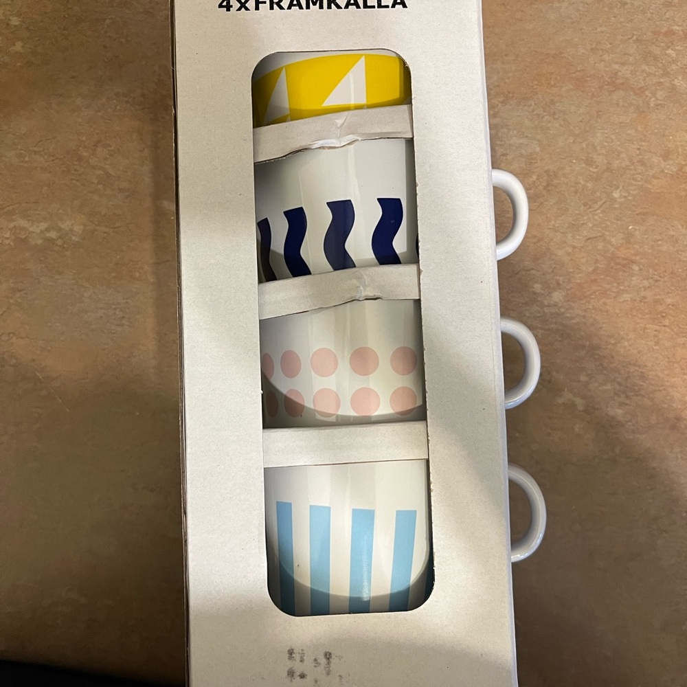 4 coffee cups still in package